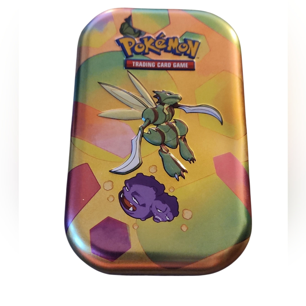 Pokémon Trading Card Game Tin.  Comes With 10 Random Cards